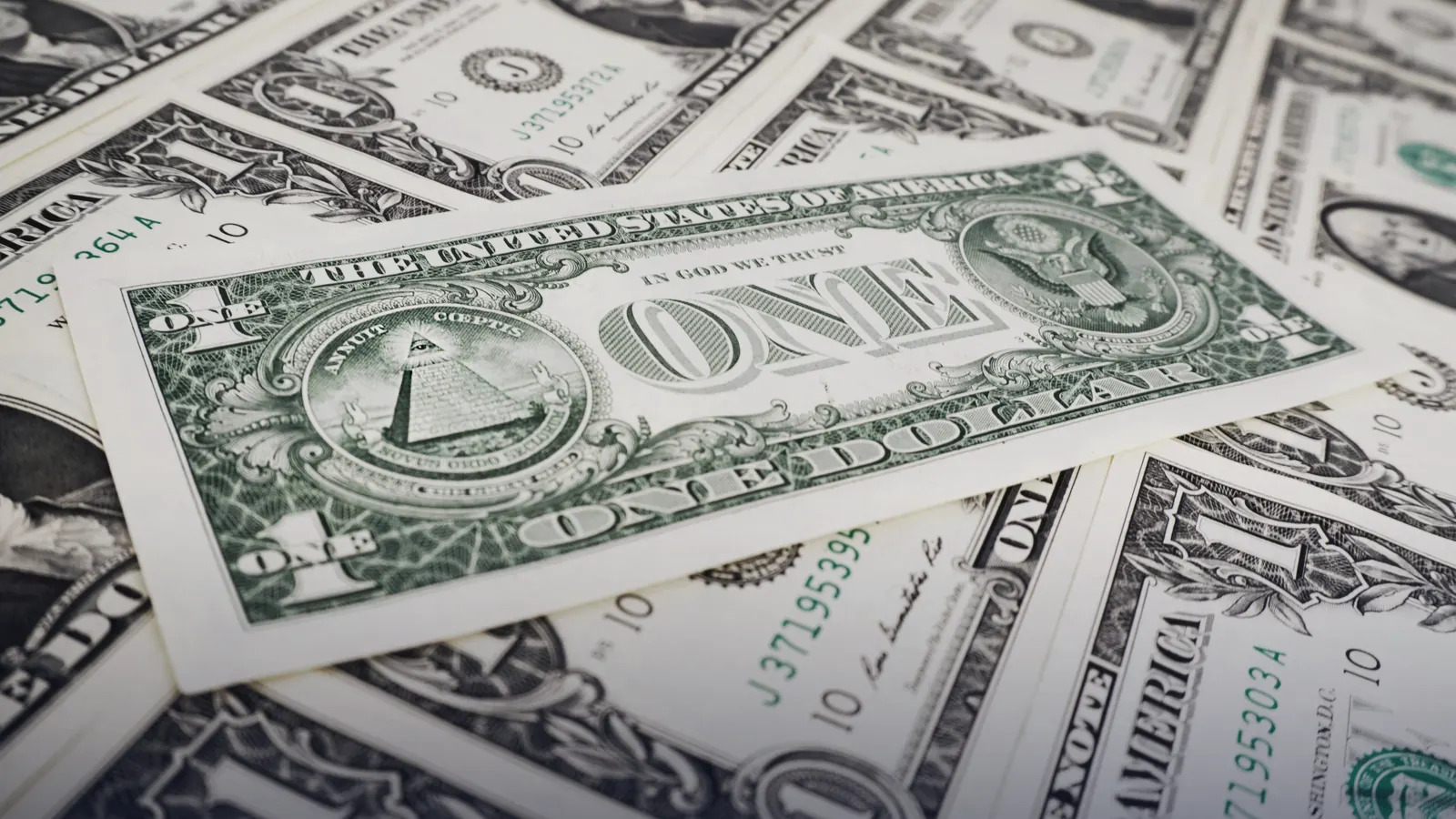 Scattered US one-dollar bills