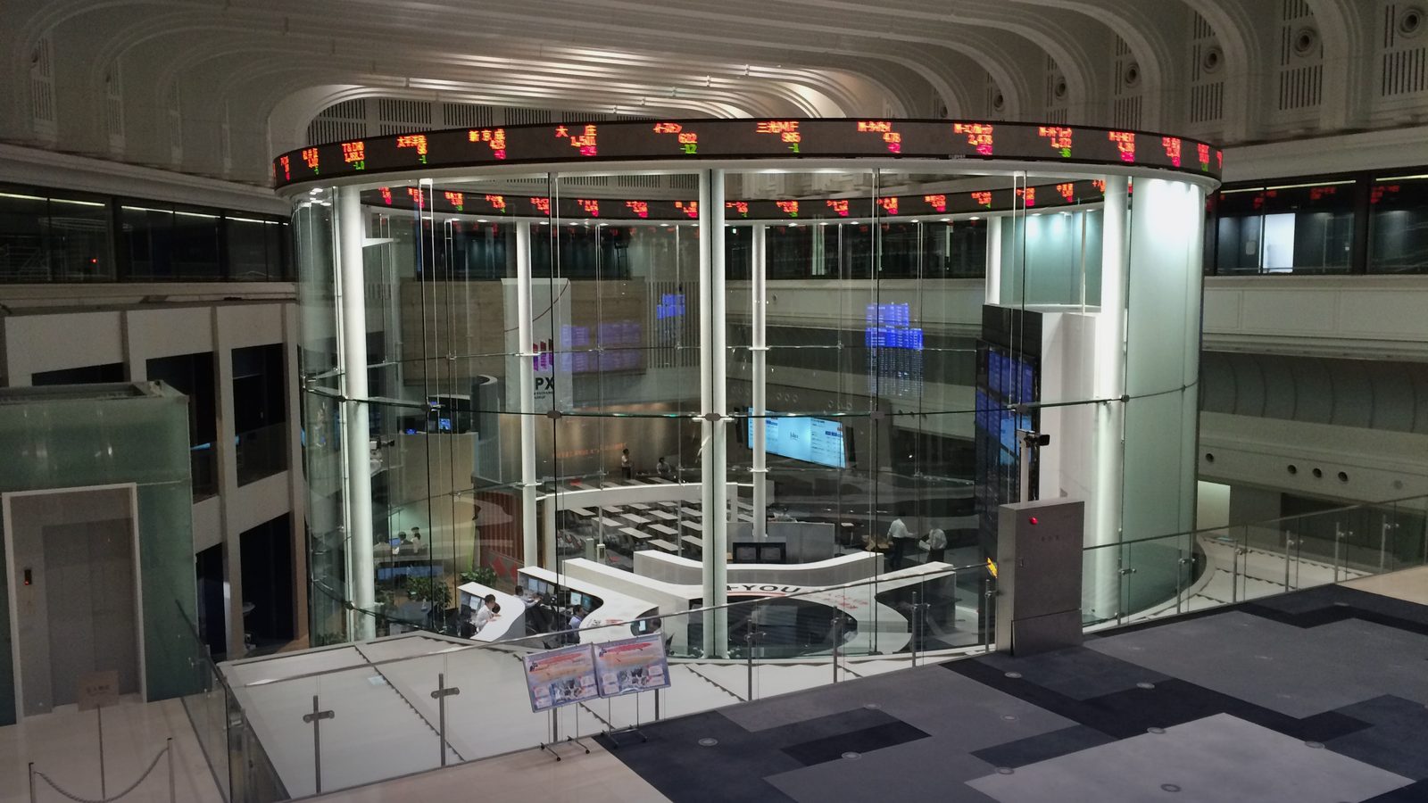 Inside the Tokyo Stock Exchange, with its ring-shaped ticker